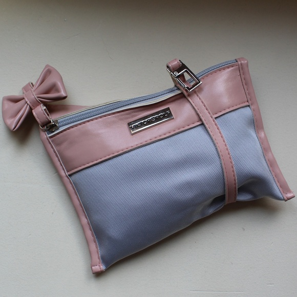 Viktor & Rolf Handbags - NWOT Wristlet-travel bag-clutch with amenities